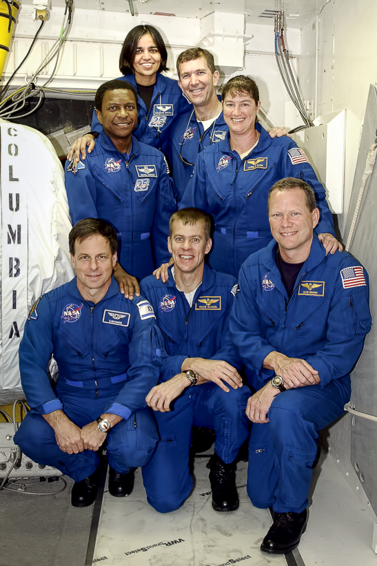 STS-107 crew; in front are (left to right) Payload Specialist Ilan Ramon, Pilot William "Willie" McCool and Mission Specialist David Brown. Standing in back are (left to right) Payload Commander Michael Anderson, Mission Specialist Kalpana Chawla, Commander Rick Husband and Mission Specialist Laurel Clark